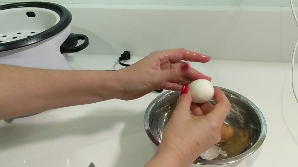 Peel the shell in water. Shell is easier to remove.